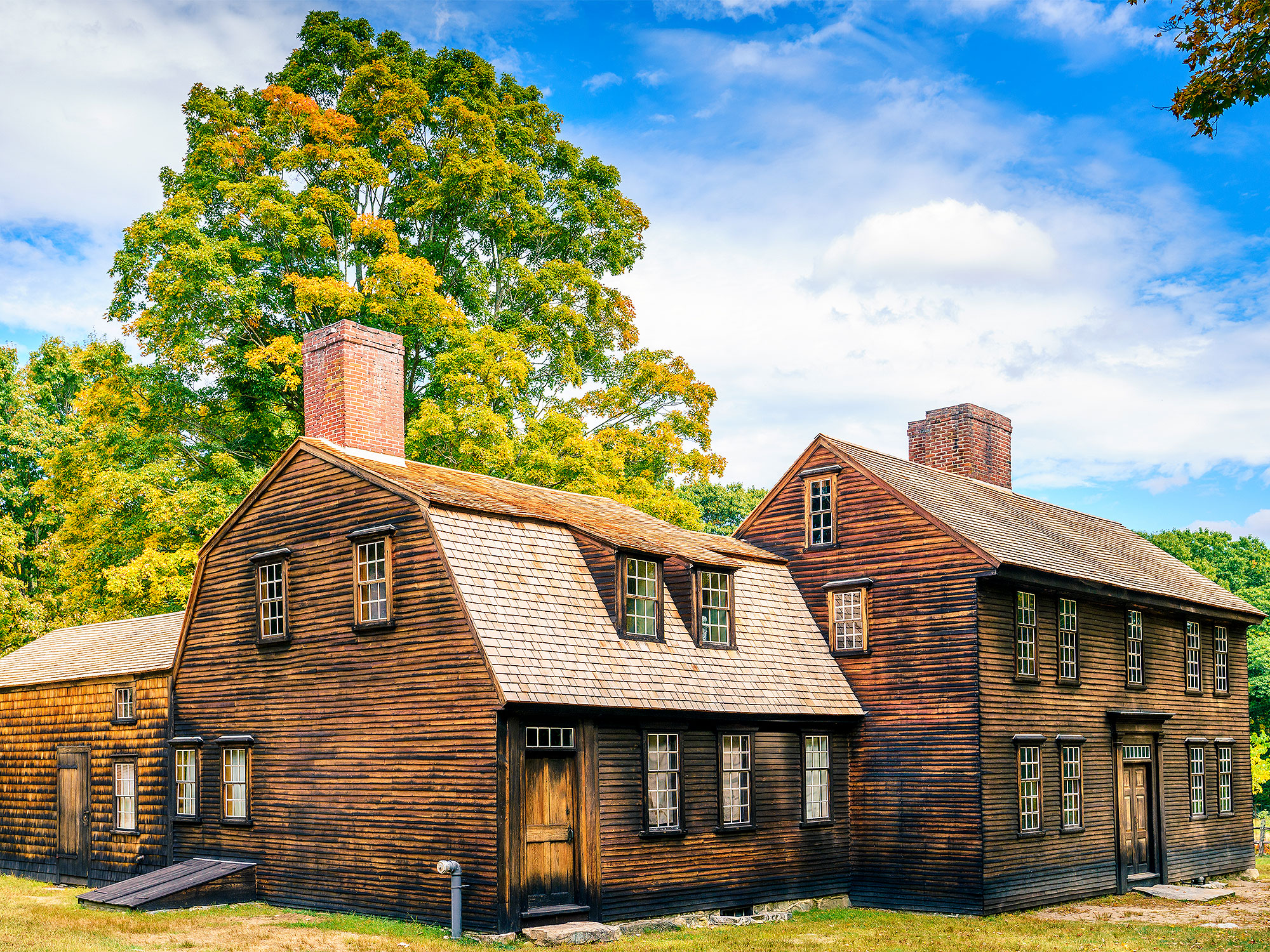 A pair of large, wooden homes