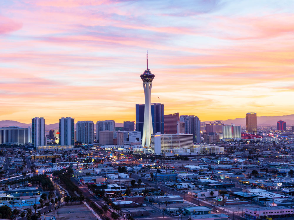 Stratosphere building over Las Vegas skyline at sunset