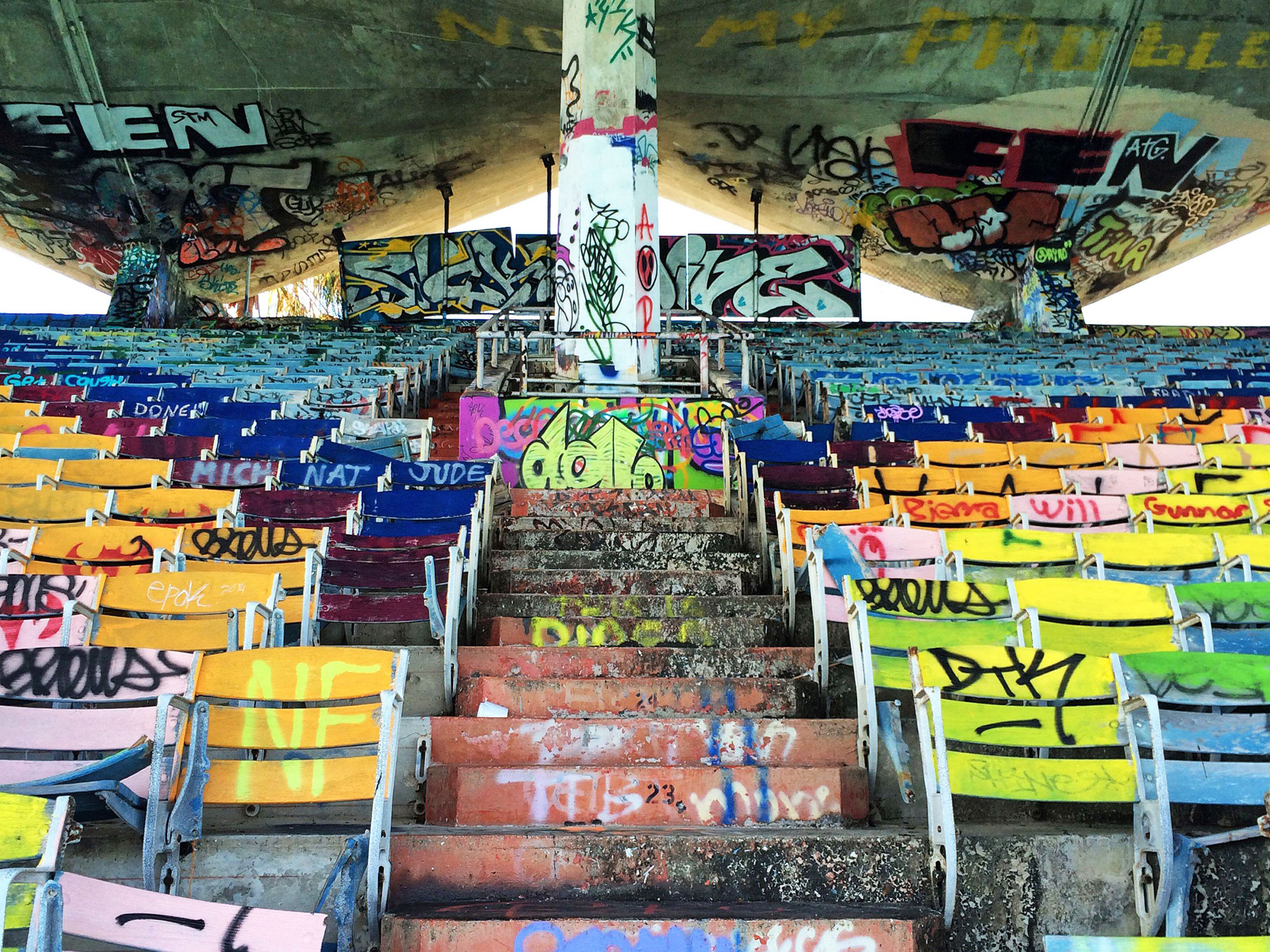 Abandoned stands in Miami Marine Stadium covered in grafitti
