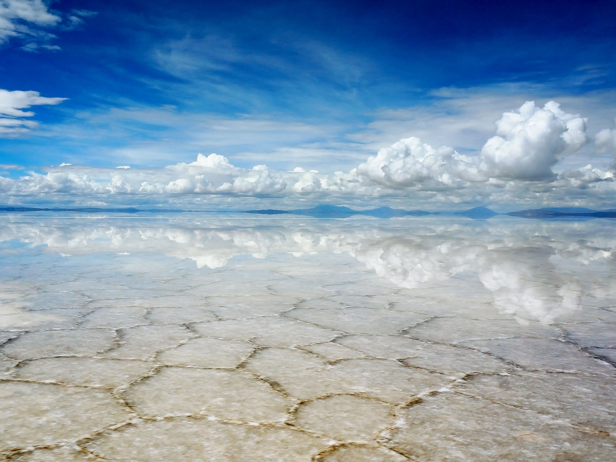 Reflective white surface of Salar de Uyuni in Bolivia