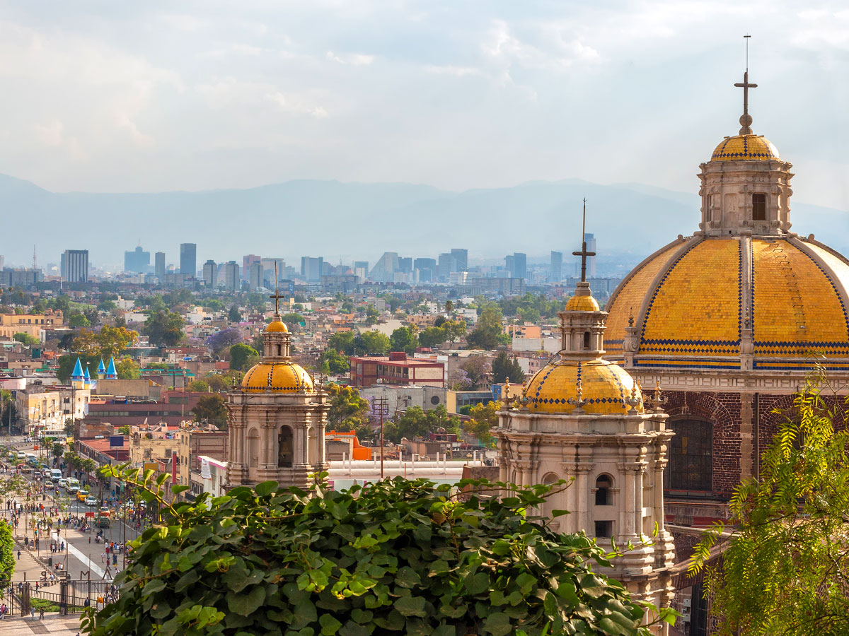 Gold-domed rooftops of church overlooking Mexico City