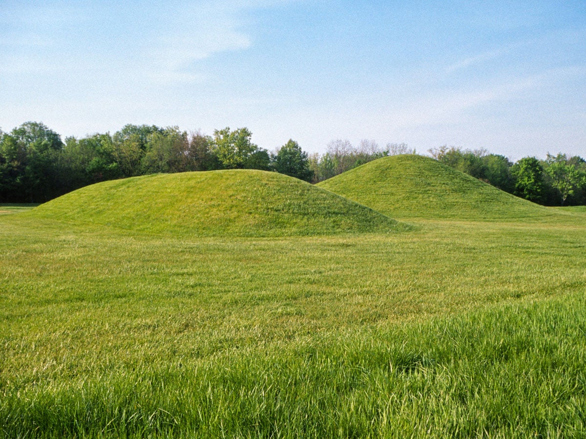 Grass-covered earthen mounds in Ohio's Hopewell Culture National Historical Park