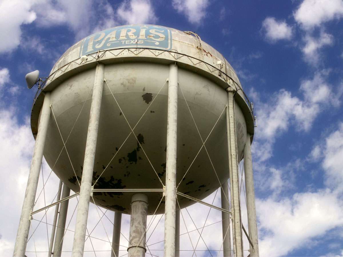 View up at water tower of Paris, Texas