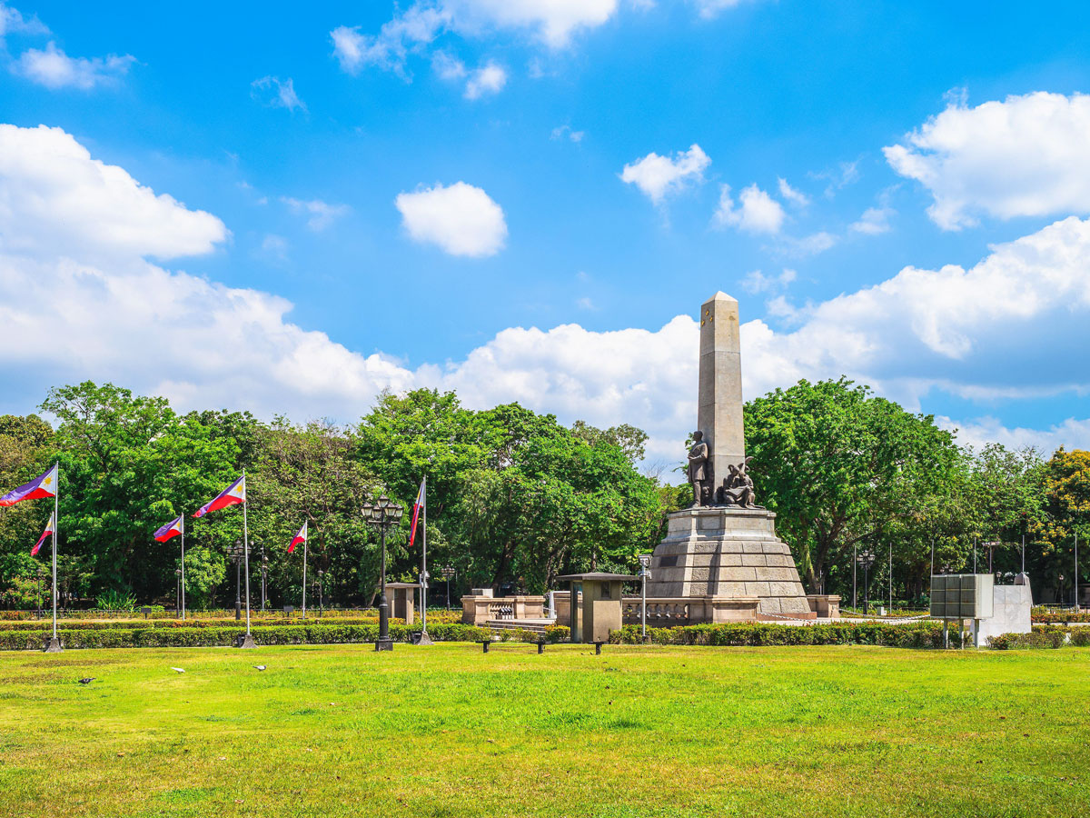 Monument in grassy park in Manila, the Philippines