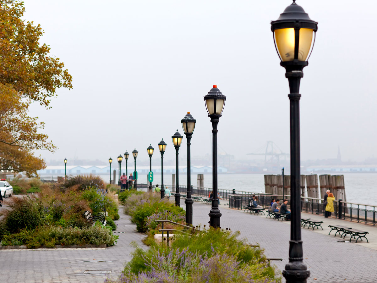 Lampposts lining walkway along Hudson River in New York, New York