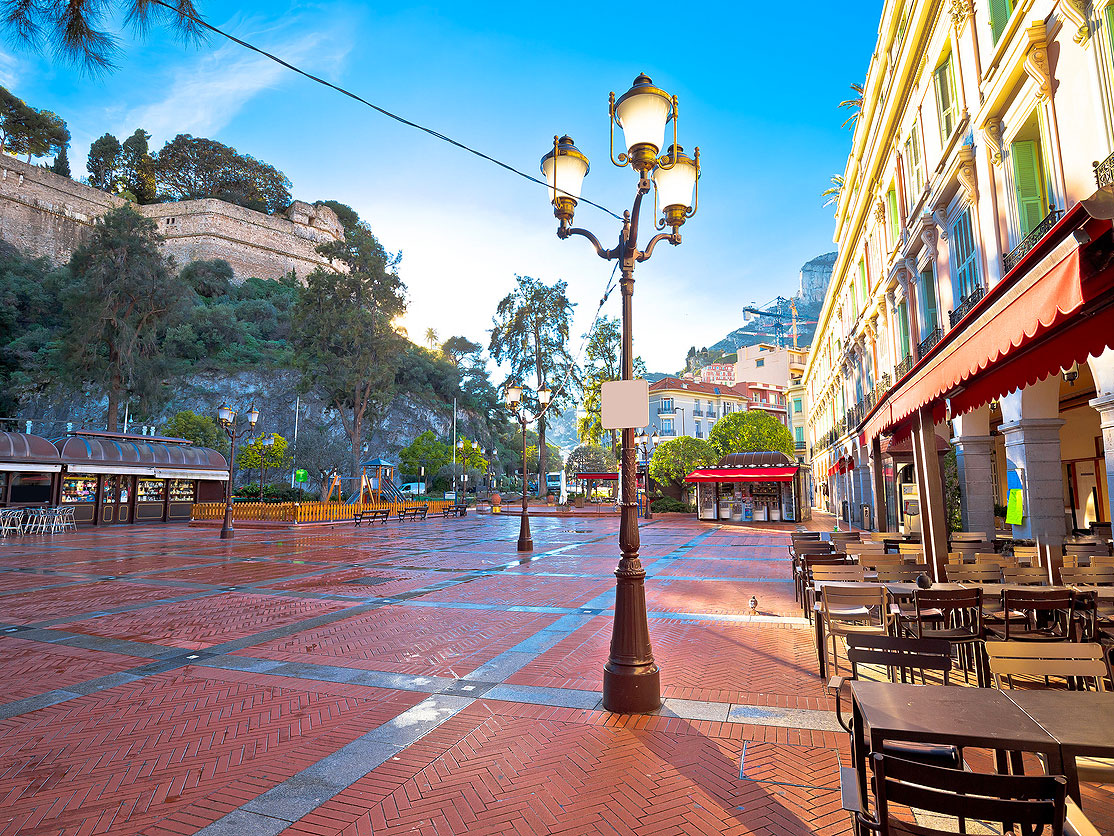 Empty tables along plaza in Monaco