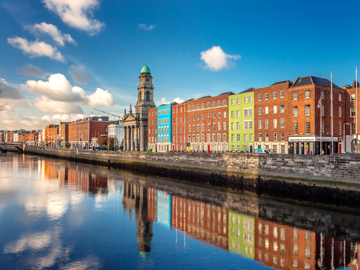 Colorful buildings along Liffey River in Dublin, Ireland