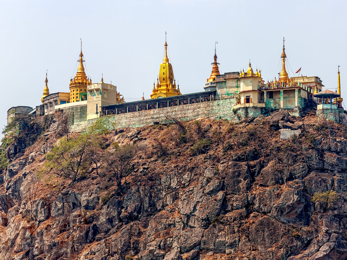 Upward-facing view of Taung Kalat monastery atop extinct volcano in Myanmar