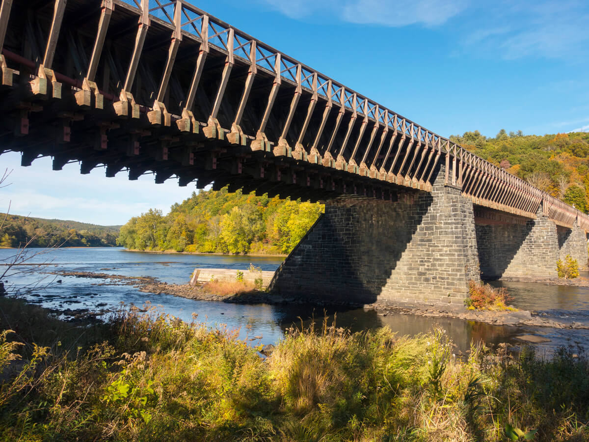 View of the Delaware Aqueduct crossing river in New York