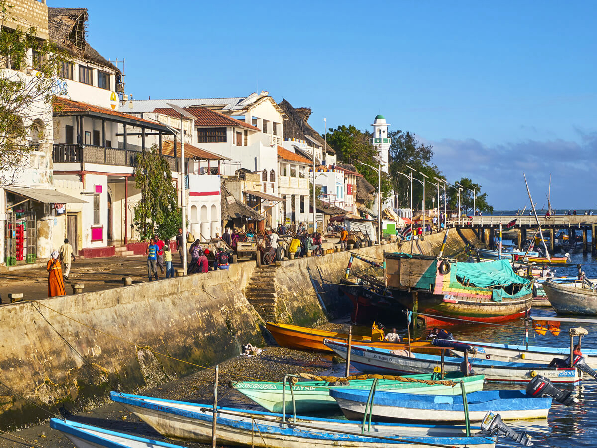People along waterfront of Lamu Island in Kenya