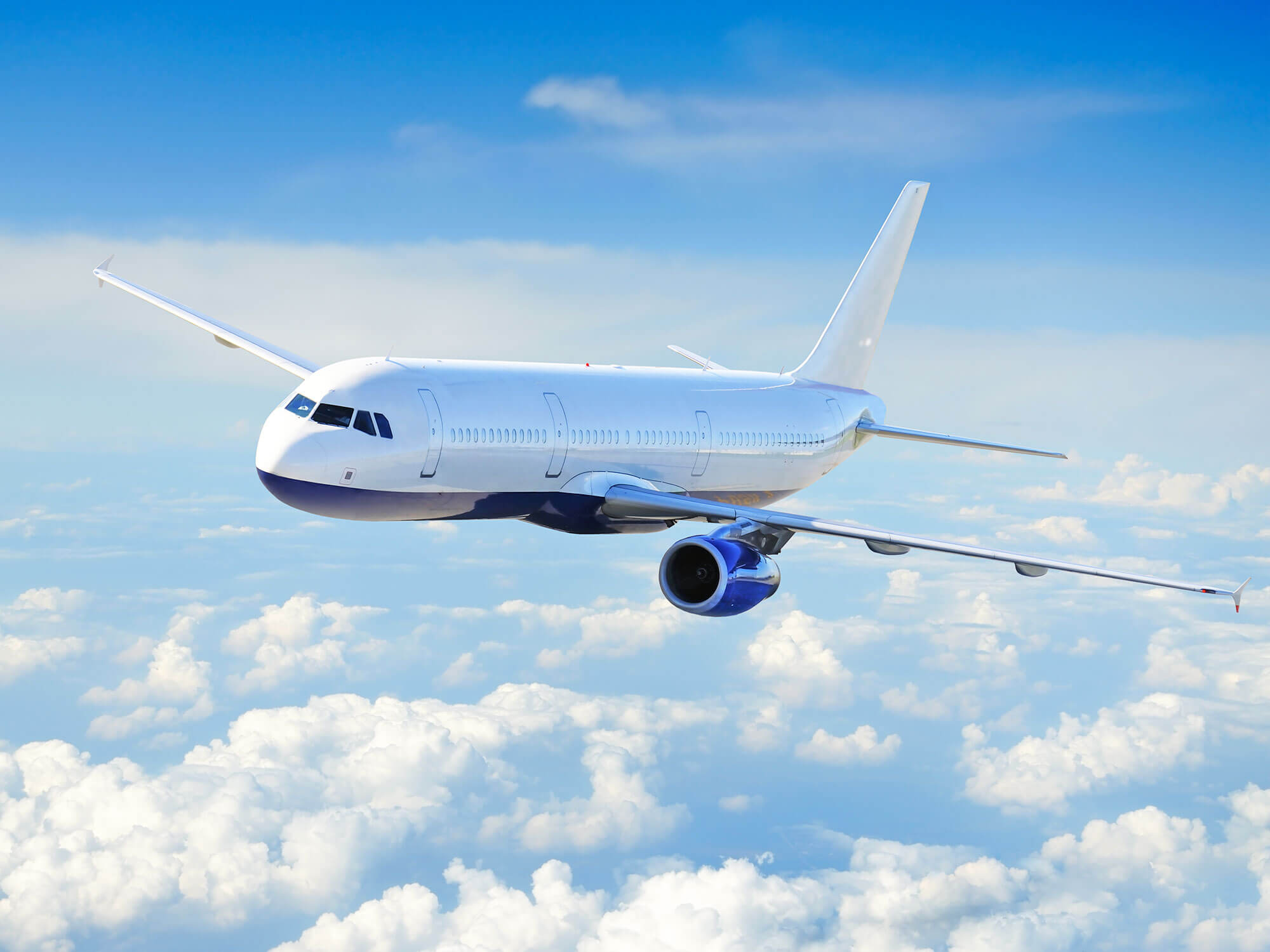 Airplane during cruise above clouds
