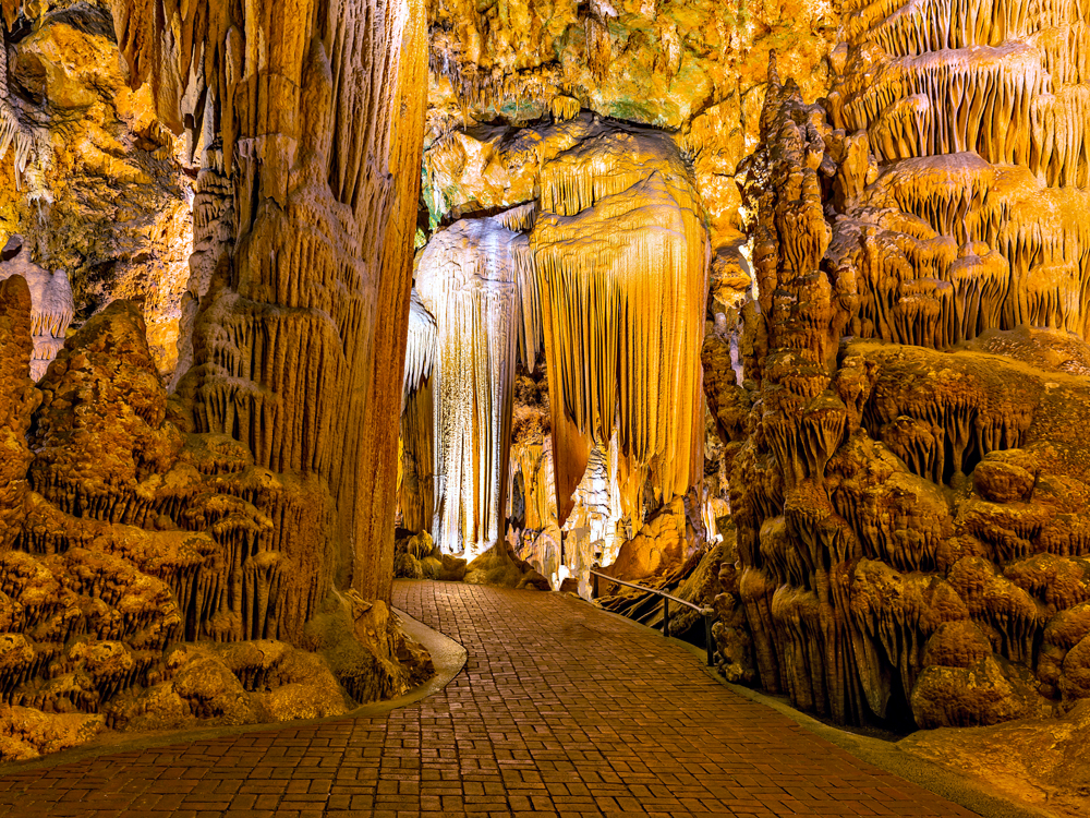 Visitor pathway under giant stalactites formations in Luray Caverns, Virginia