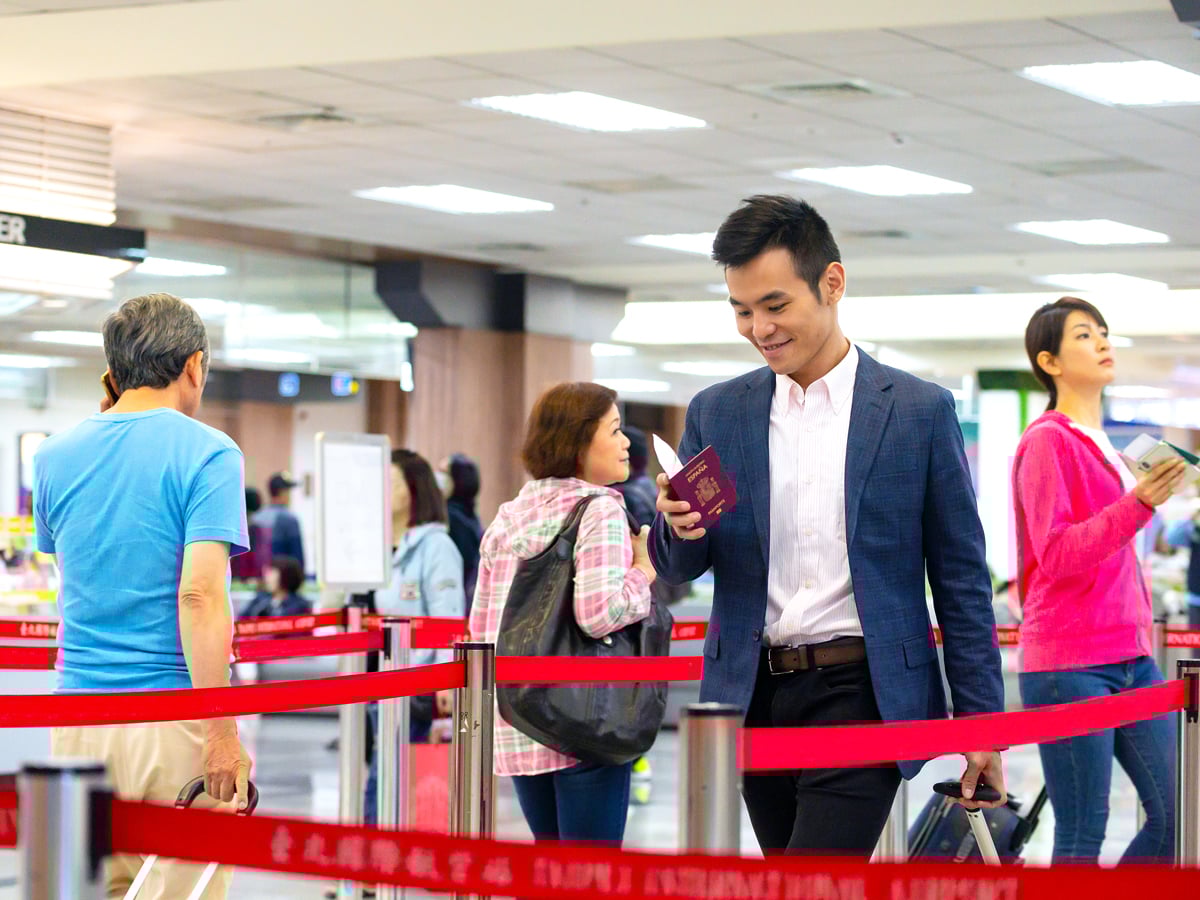 Travelers in airport security line
