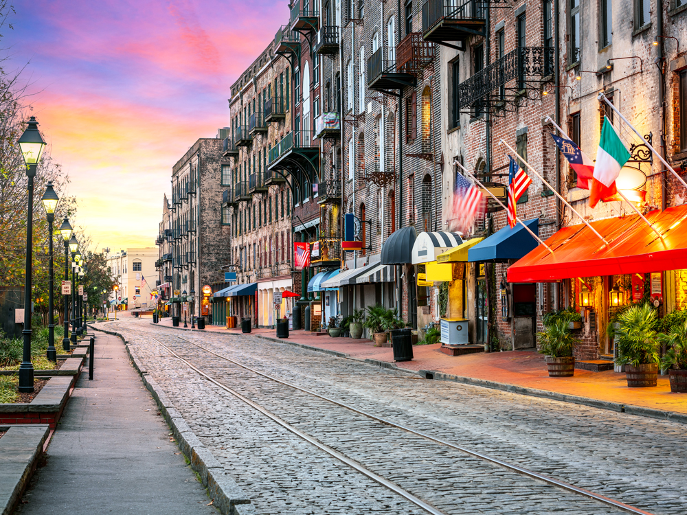 Historic cobblestone street at dusk in Savannah, Georgia