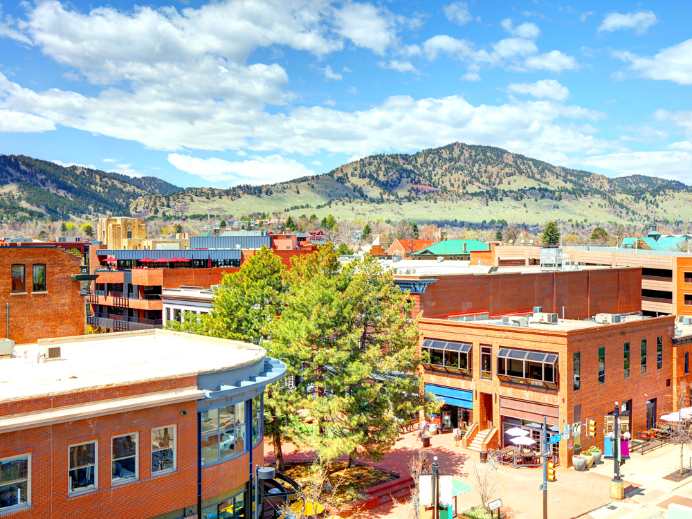 Downtown Boulder, Colorado, with mountains in background