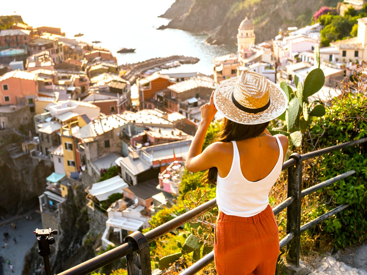 Tourist taking photo of Cinque Terre, Italy