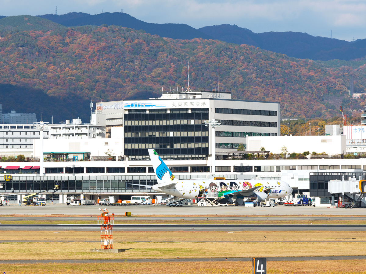 Terminal with mountains in background at Osaka's Itami Airport