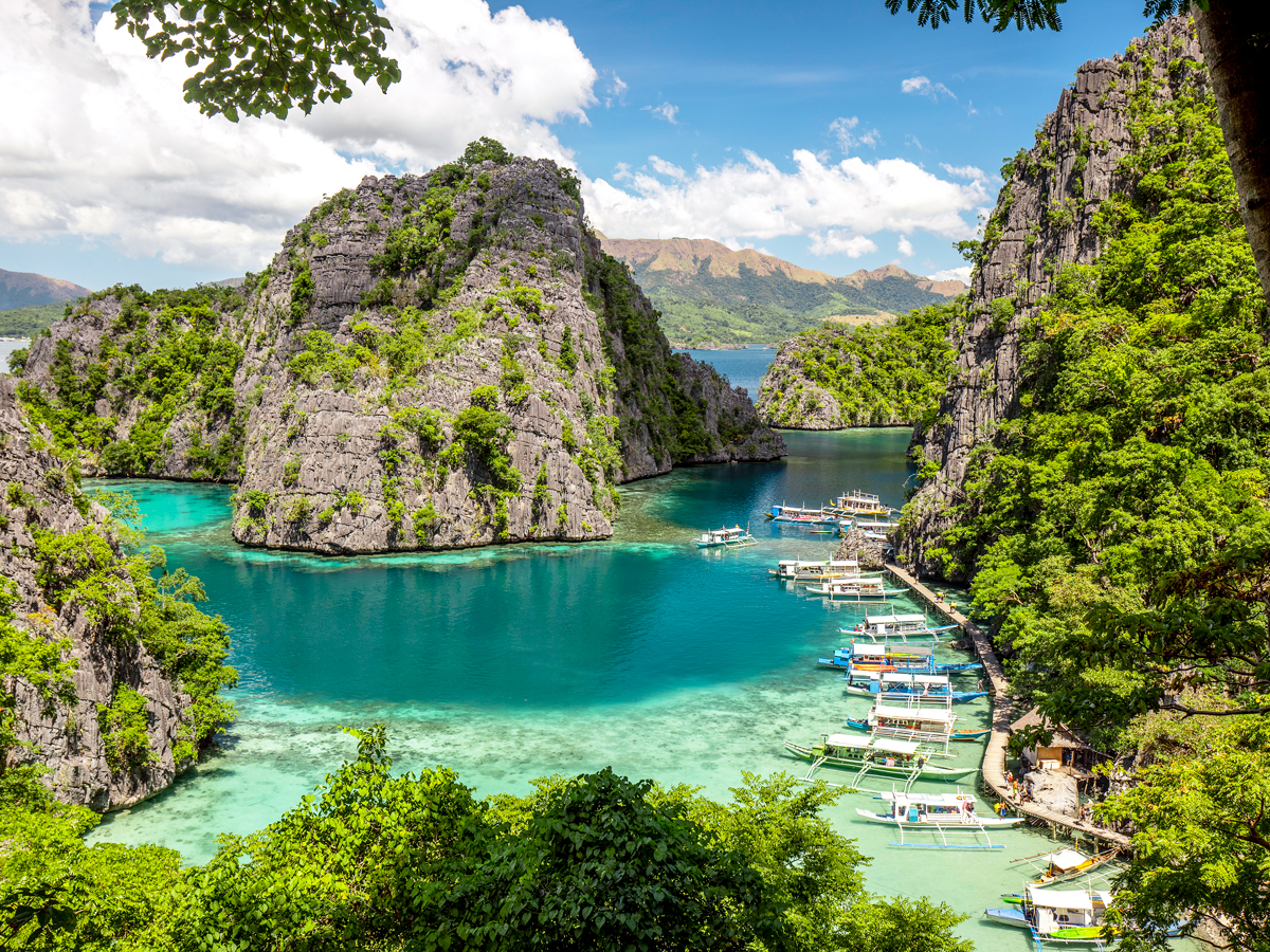 Boats docked in the Philippine island province of Palawan, seen from above