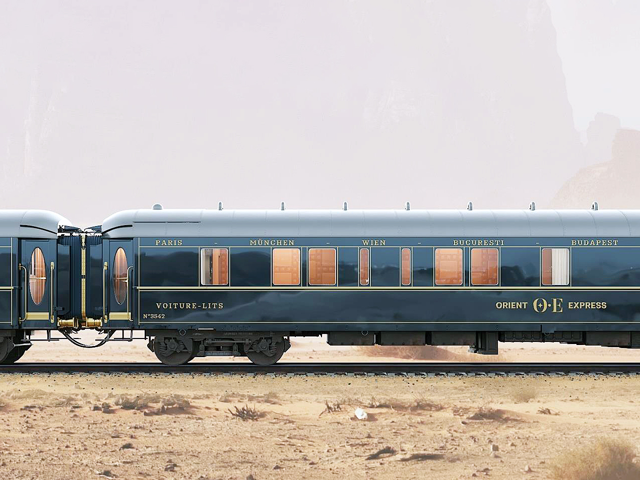 Vintage Orient Express train cars on rail track