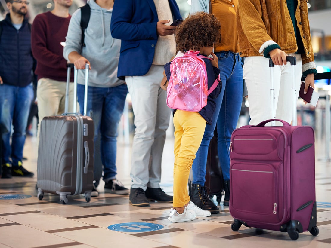 Airline passengers standing in line