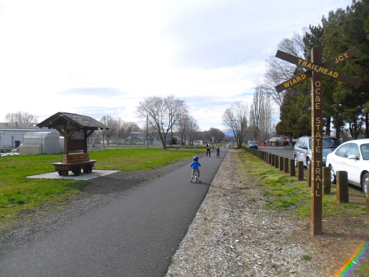 People enjoying the OC&E Woods Line State Trail in Oregon