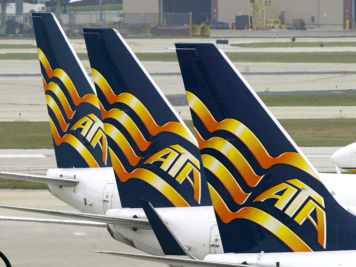 Tails of ATA planes parked at terminal