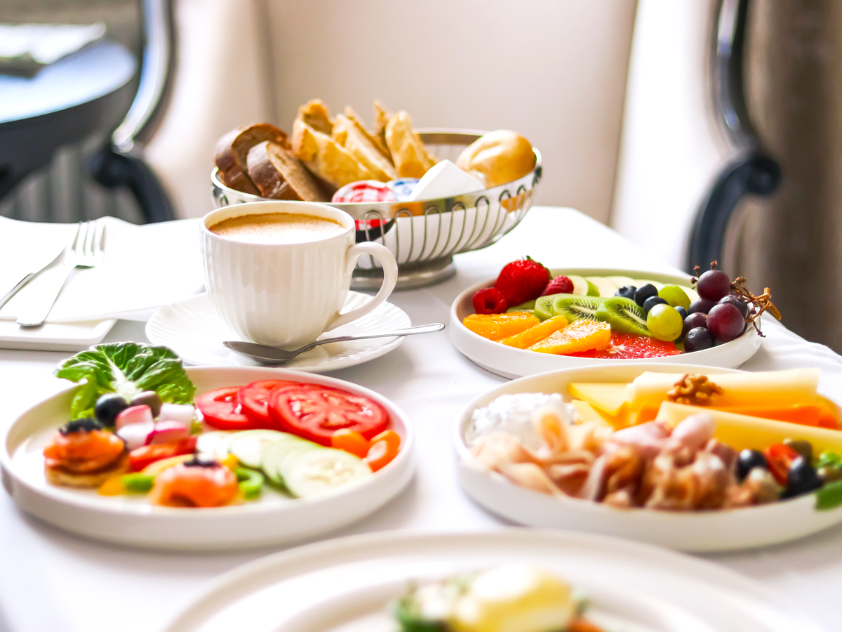 Hotel room service meal on white tablecloth