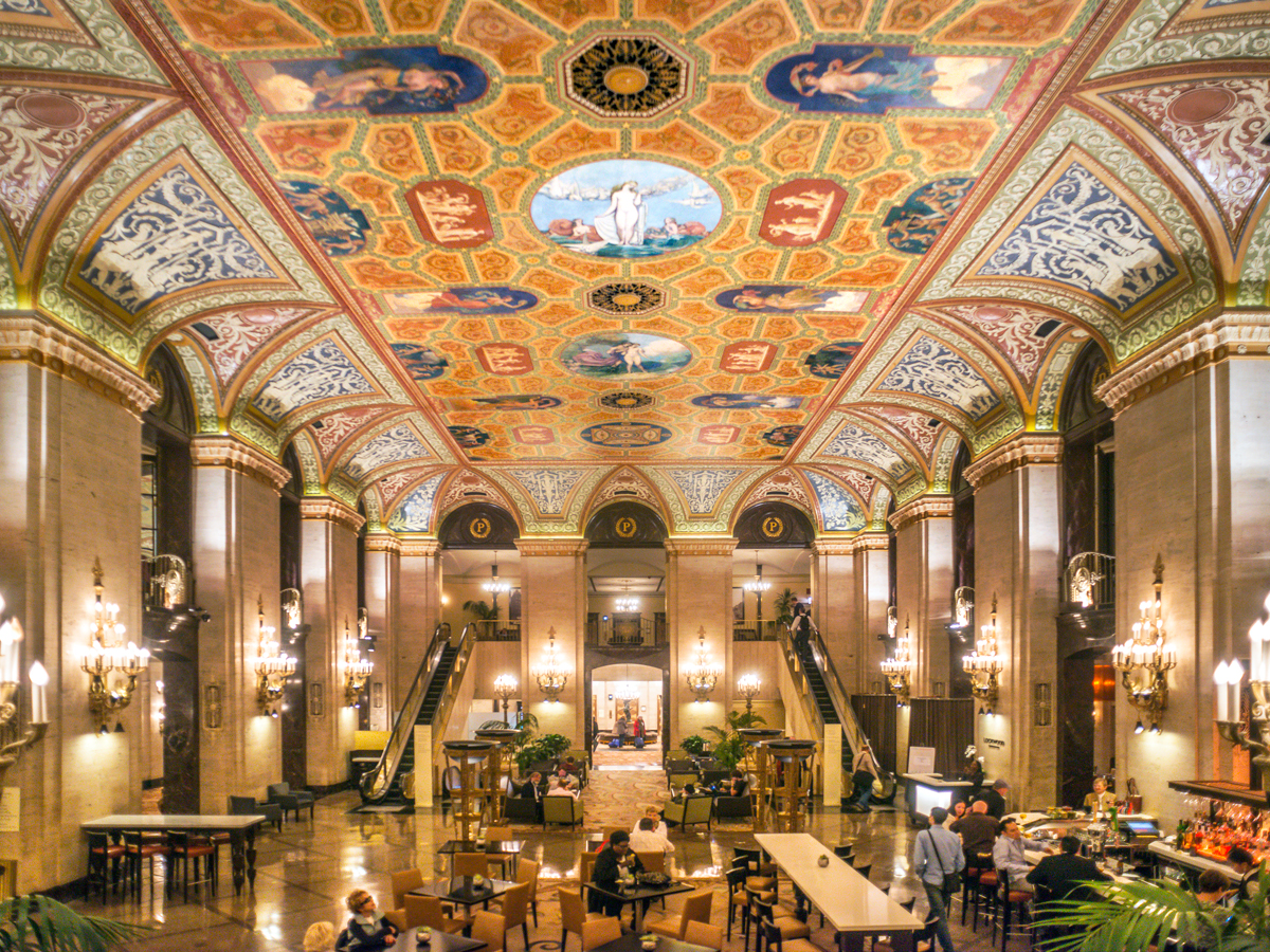Soaring mural-covered ceilings of the Palmer House hotel in Chicago, Illinois