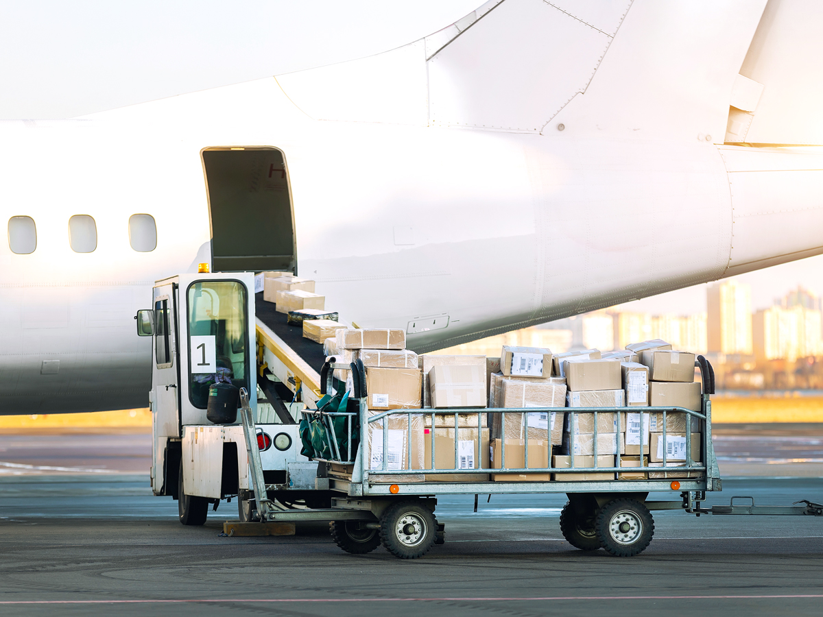 Cargo being loaded on airplane