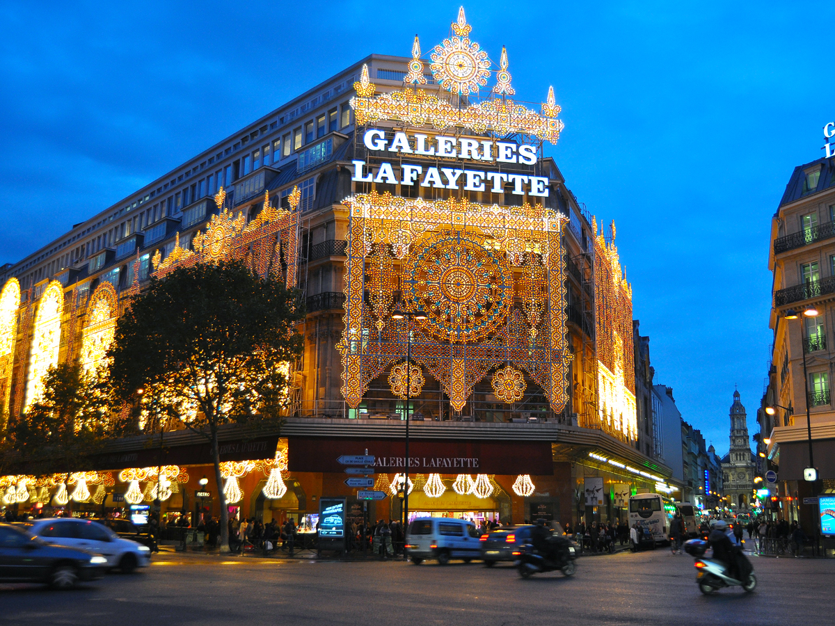 Galeries Lafayette in Paris, France, illuminated during evening hours