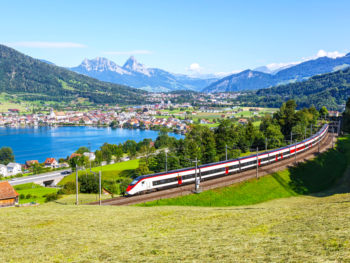 Train traveling through the Swiss Alps