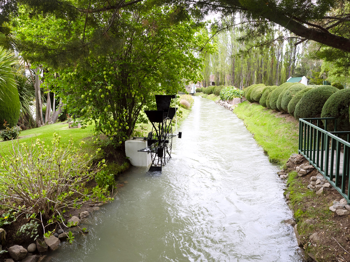 A traditional Welsh water wheel beside a creek in Patagonia, Argentina