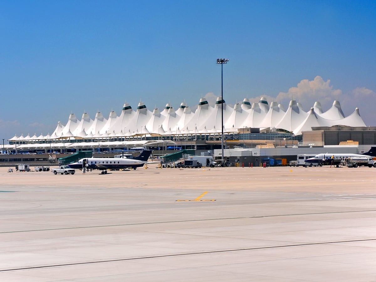 Aircraft parked in front of terminal building at Denver International Airport in Colorado