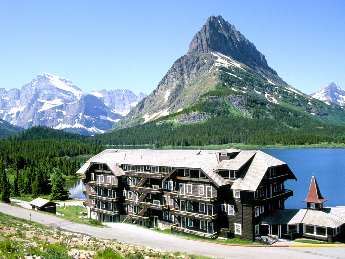 Many Glacier Hotel with views of lake and mountains in Glacier National Park, Montana