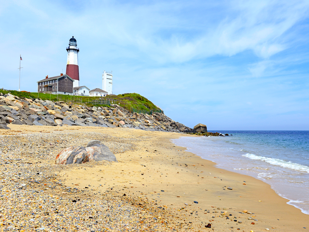 Lighthouse overlooking sandy beach in Amagansett, New York