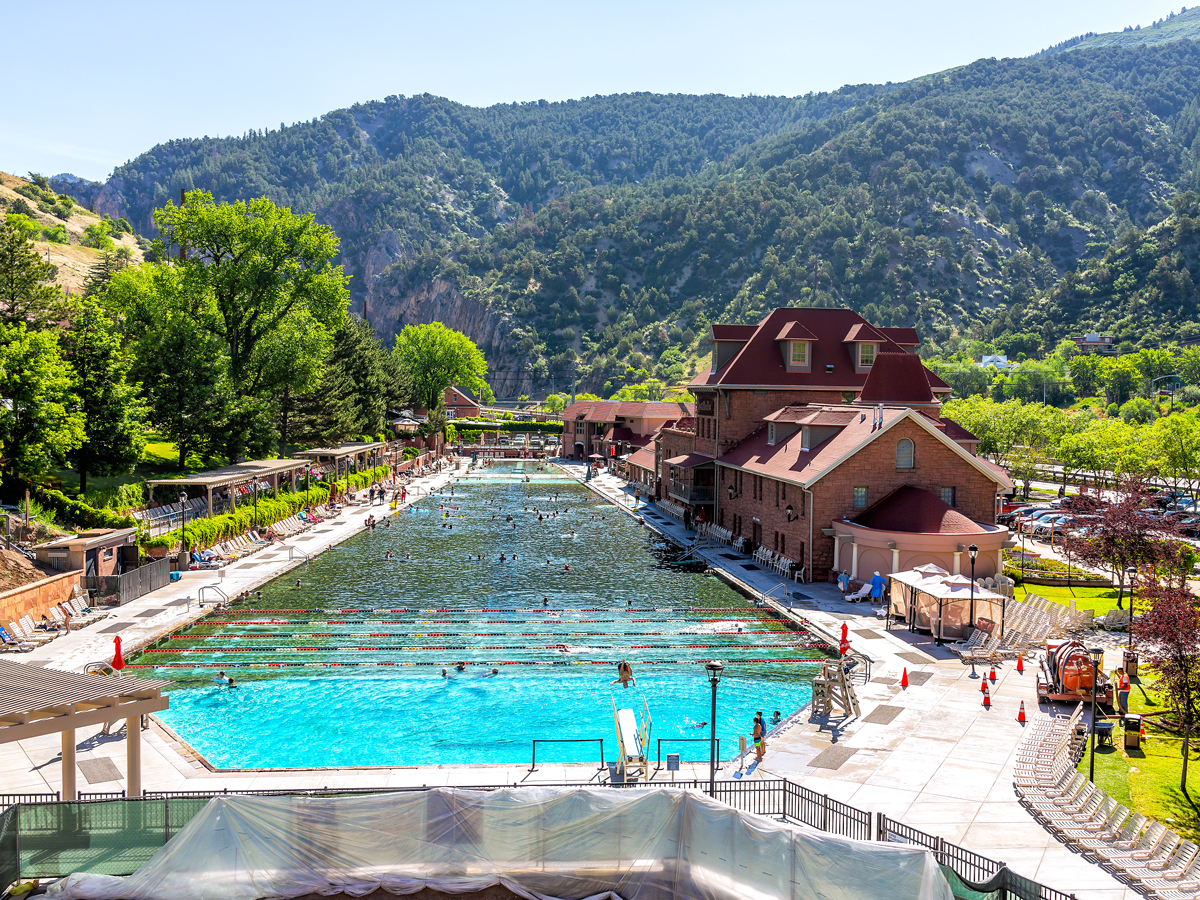 Hot springs pool surrounded by mountains in Glenwood Springs, Colorado