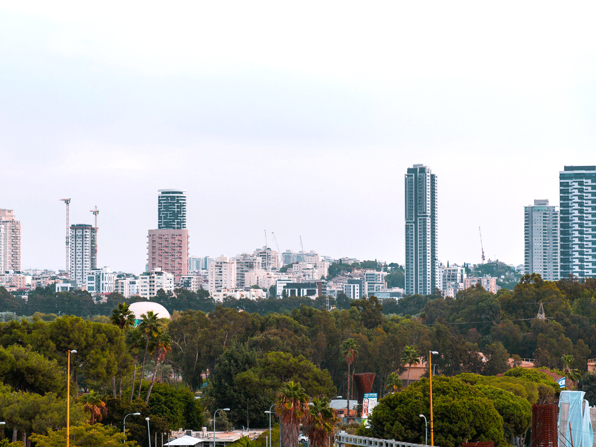 High-rise buildings over treetops in Bnei Brak, Israel