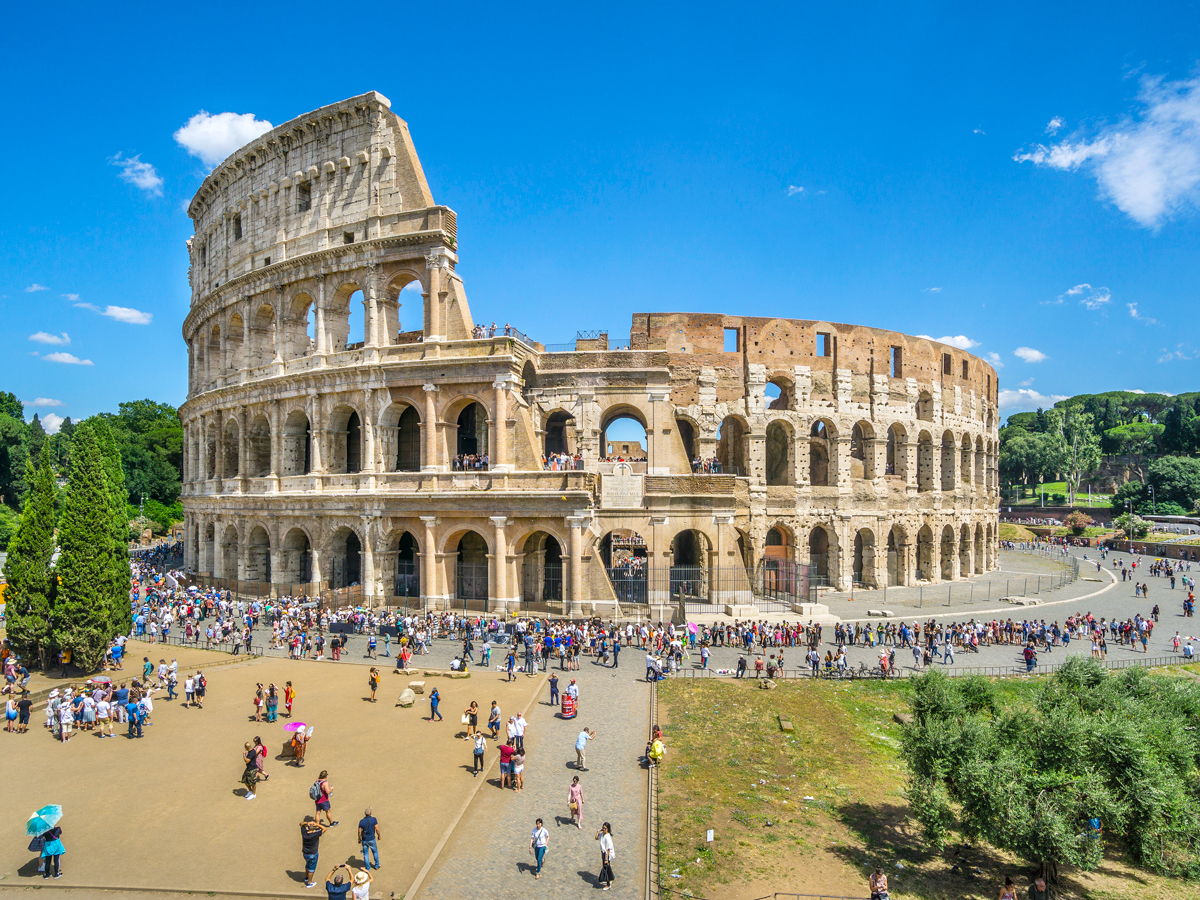 Tourists visiting the Colosseum in Rome, Italy