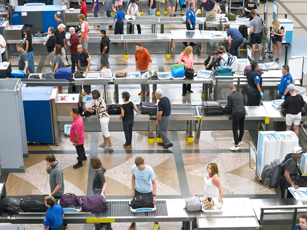 Busy TSA security line at airport, seen from above
