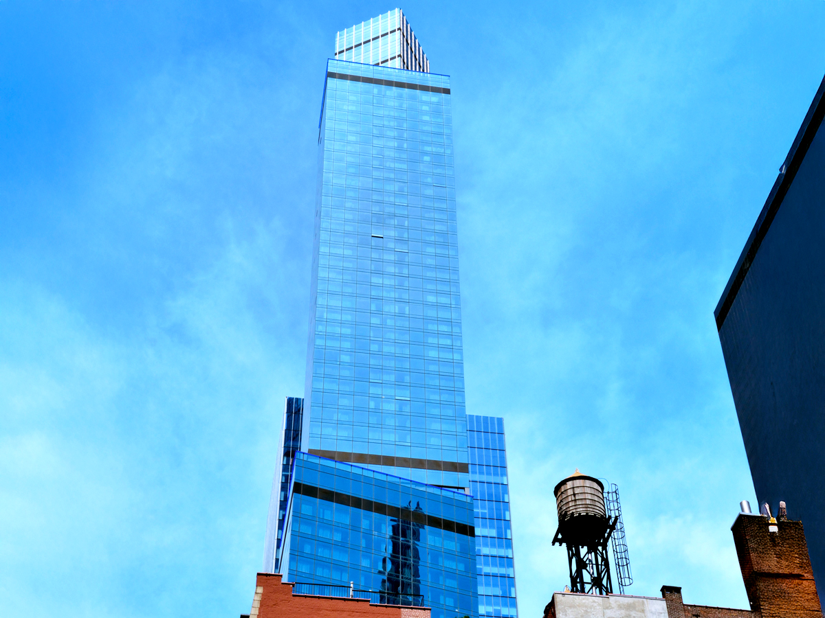 Glass facade of 1717 Broadway in New York City