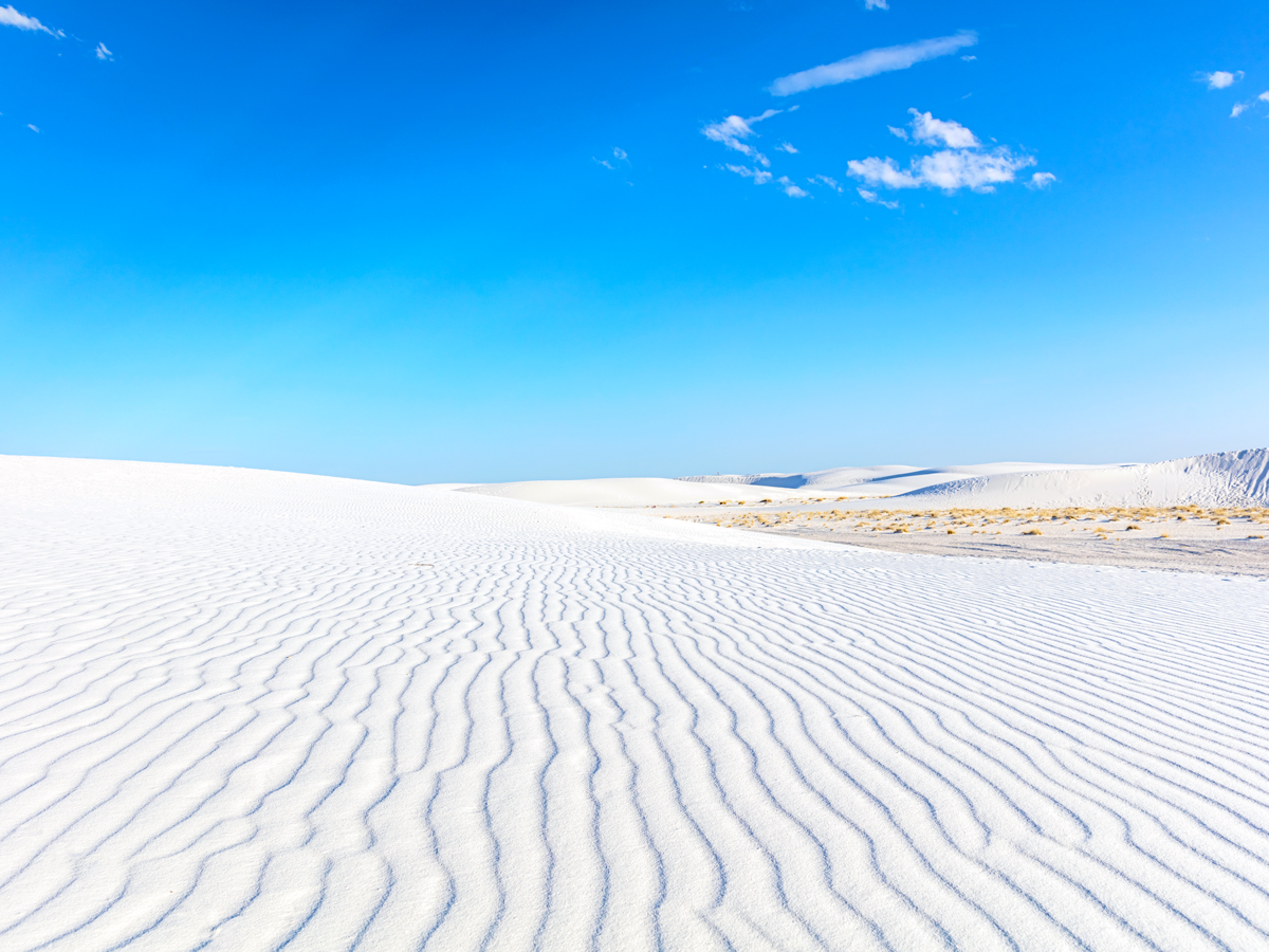 Glistening white sand dunes in White Sands National Park, New Mexico
