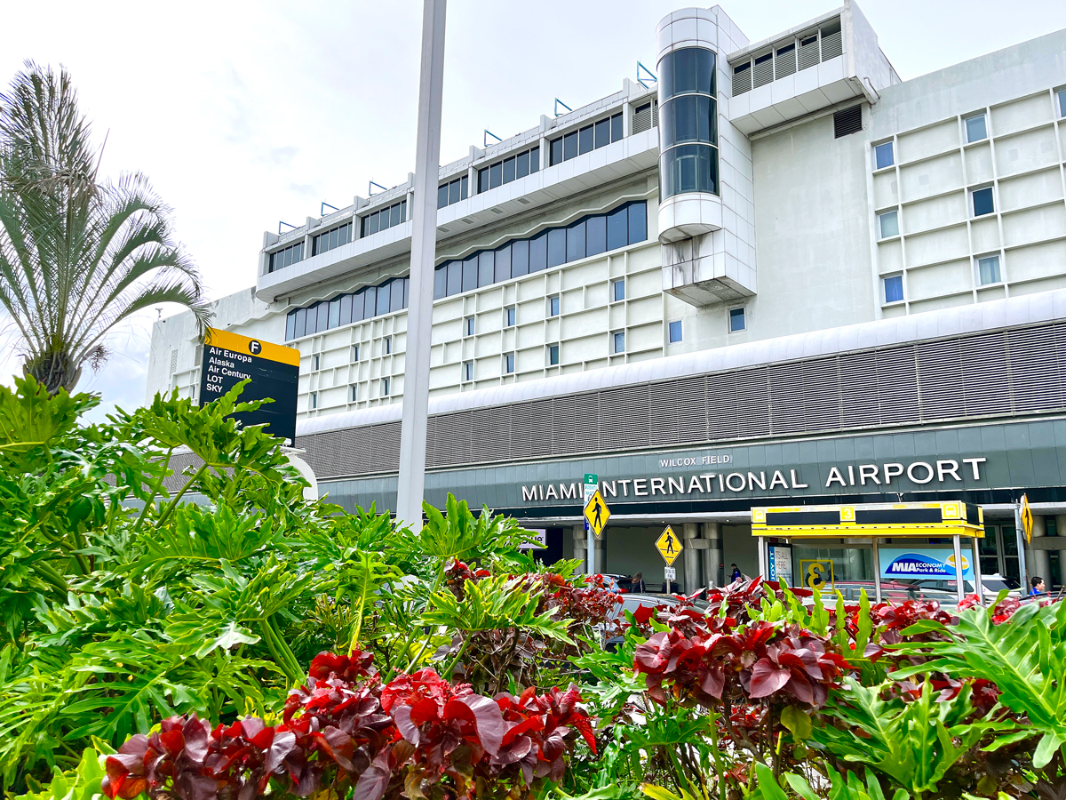 Flowers and plants beside passenger drop-off are at Miami International Airport