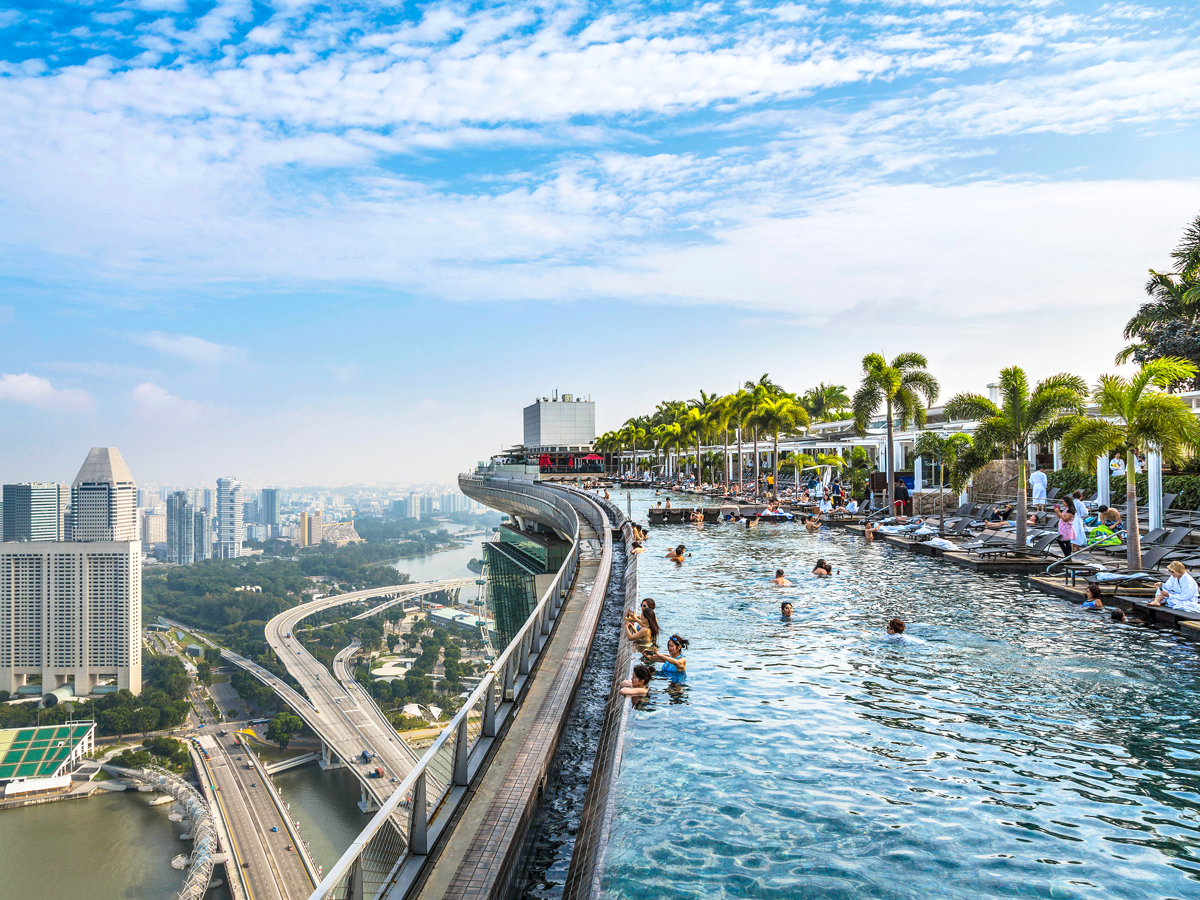 Rooftop infinity pool at Marina Bay Sands overlooking Singapore skyline