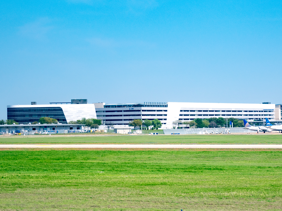 View of terminal building across airfield at Austin-Bergstrom International Airport in Texas