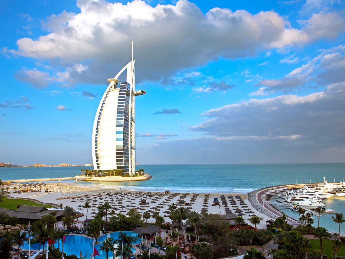 Jumeirah Burj Al Arab hotel perched over Dubai coast