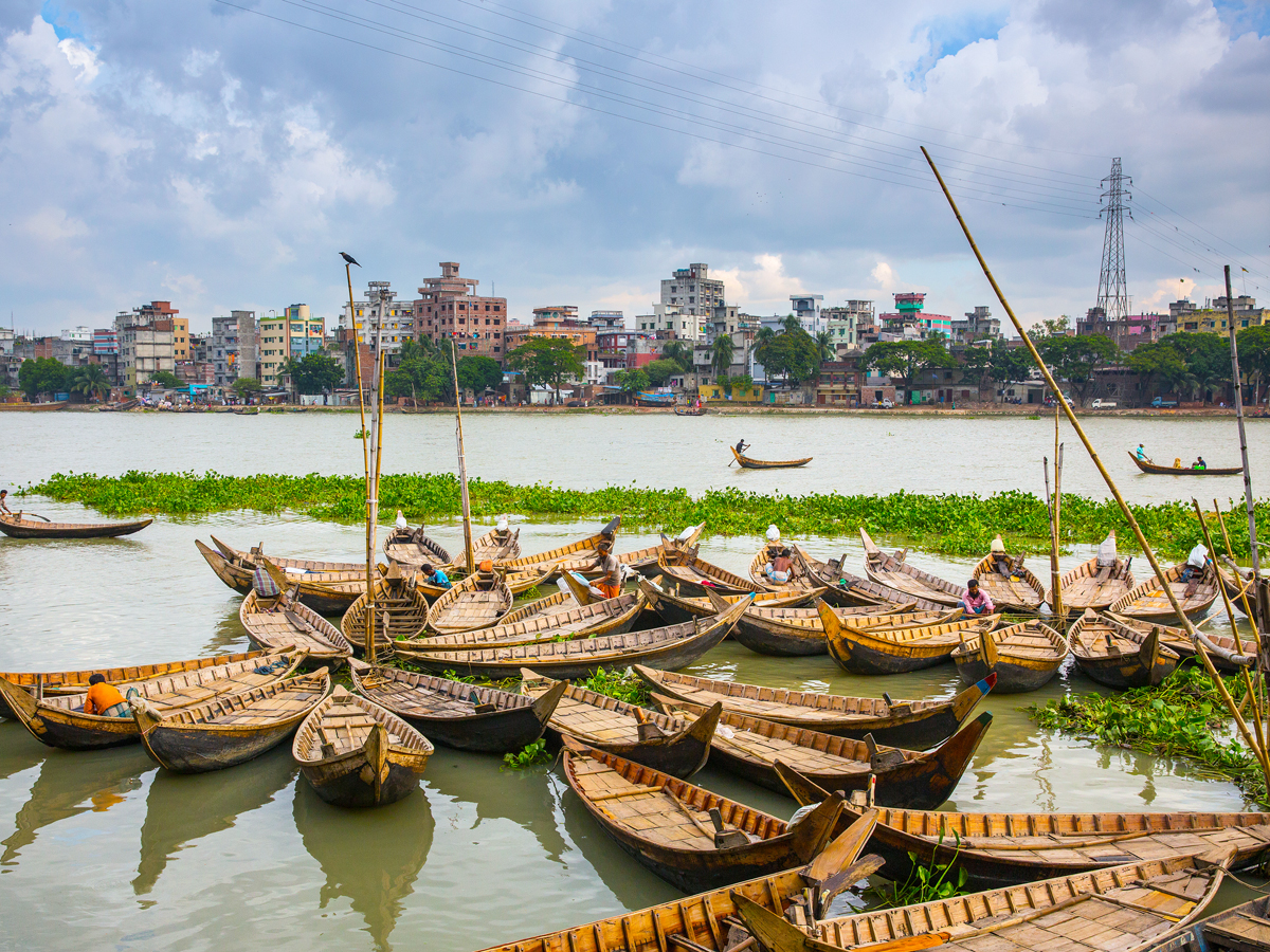 Boots moored in harbor in Dhaka, Bangladesh