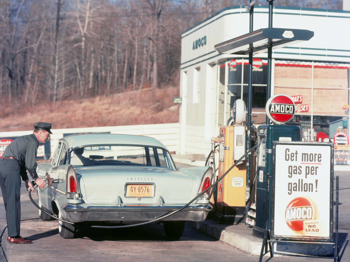 Historical image of attendant filling up tank at New Jersey gas station