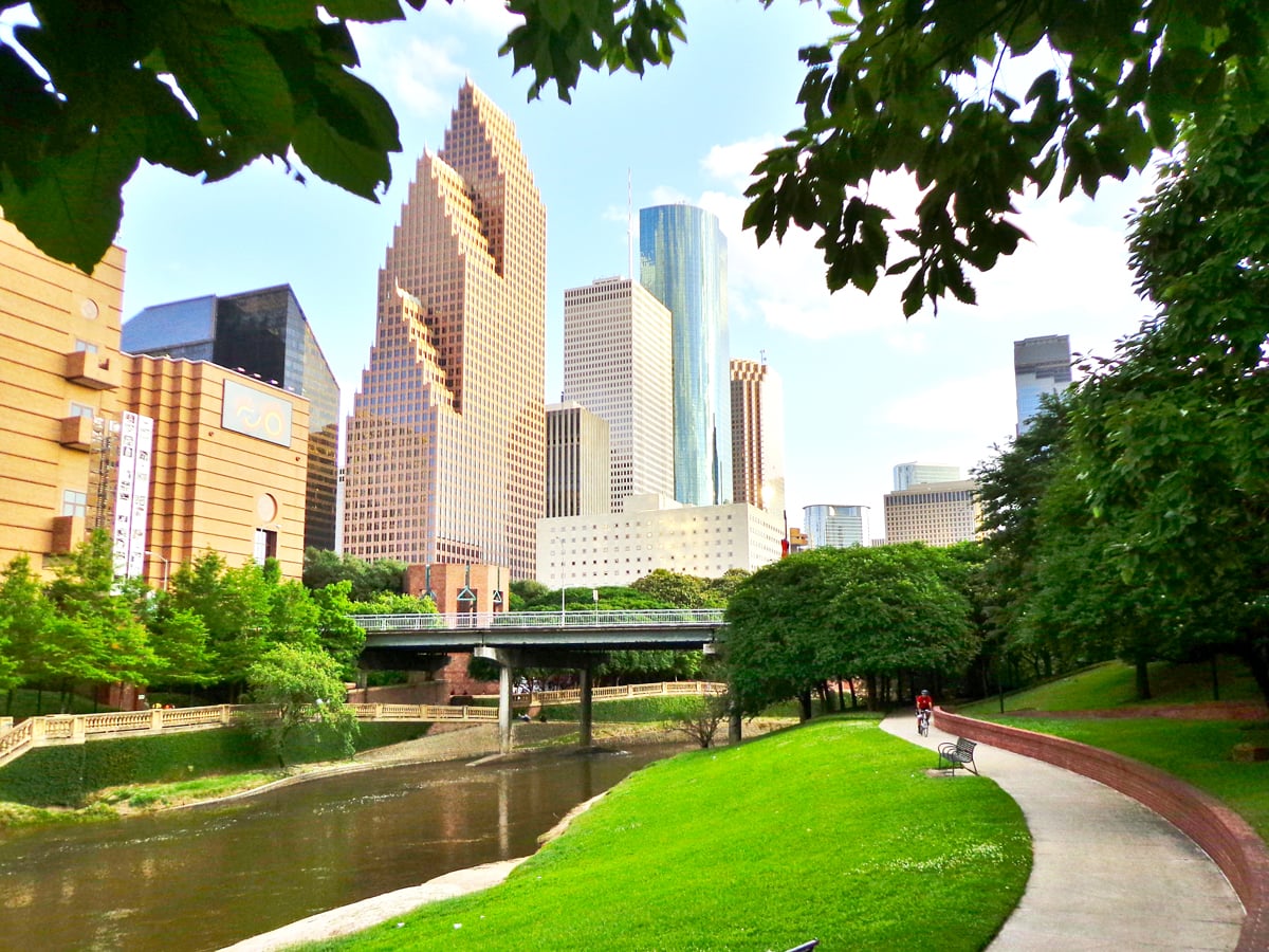 Riverfront path toward skyscrapers in downtown Houston, Texas