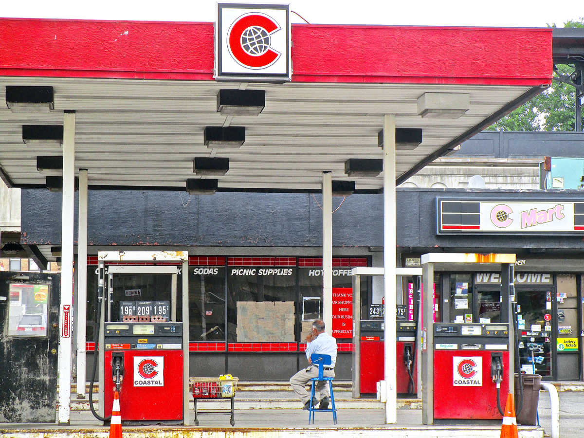 Gas station attendant sitting at New Jersey gas station