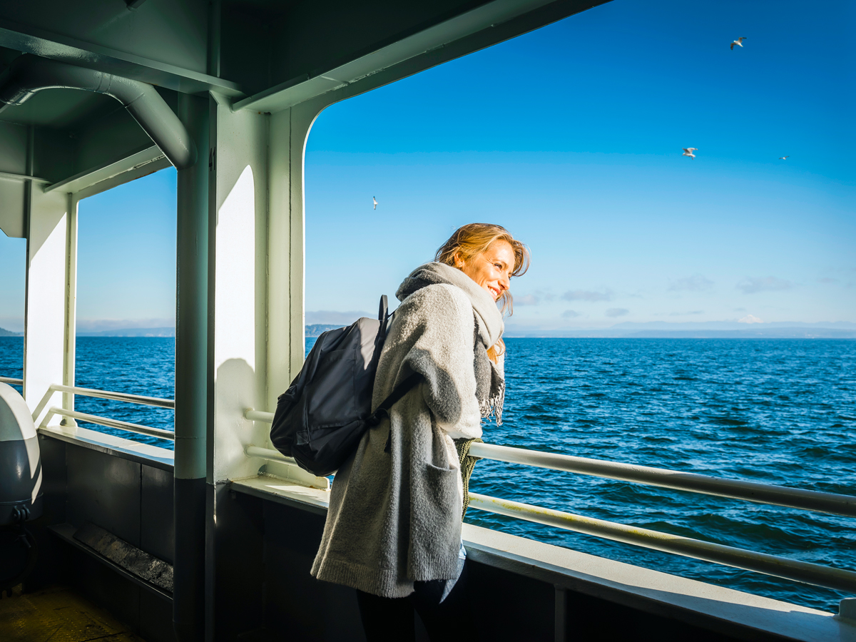 Cruise passenger looking out over open water